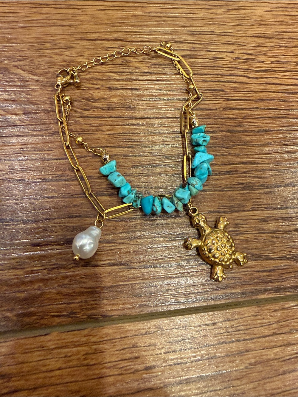 Gold Tone Turtle Pendant Bracelet with Turquoise Chips and Pearl Accent